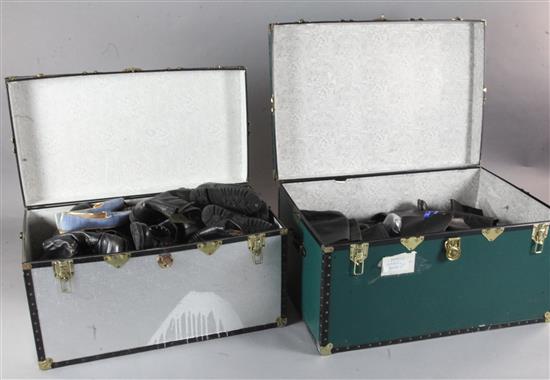 Two large trunks containing gentlemens boots and ankle boots, used for stage costume, in various sizes